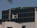 Moduły fotowoltaiczne (system) zainstalowane na fasadzie - Łódź, szpital im. Biegańskiego, budynek P i R